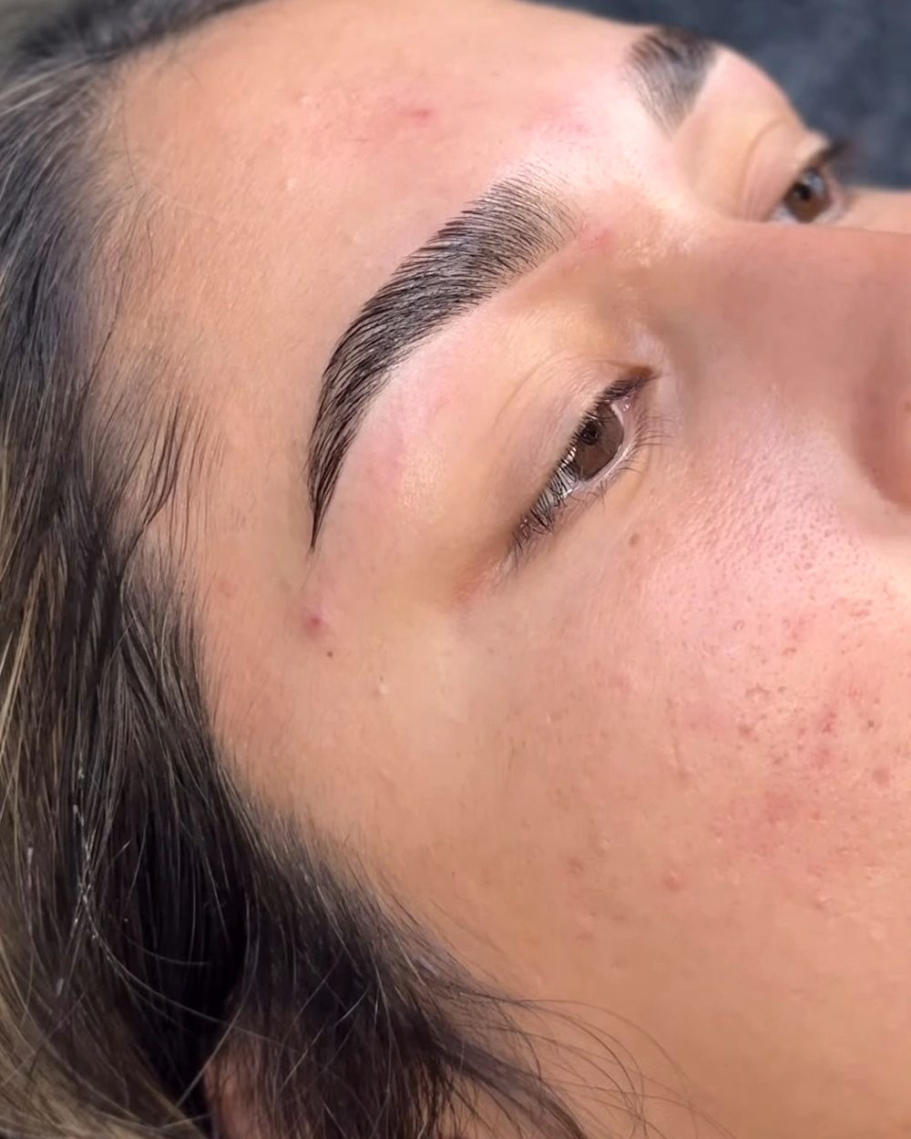 Brow lamination: laminated brow detail, close up
