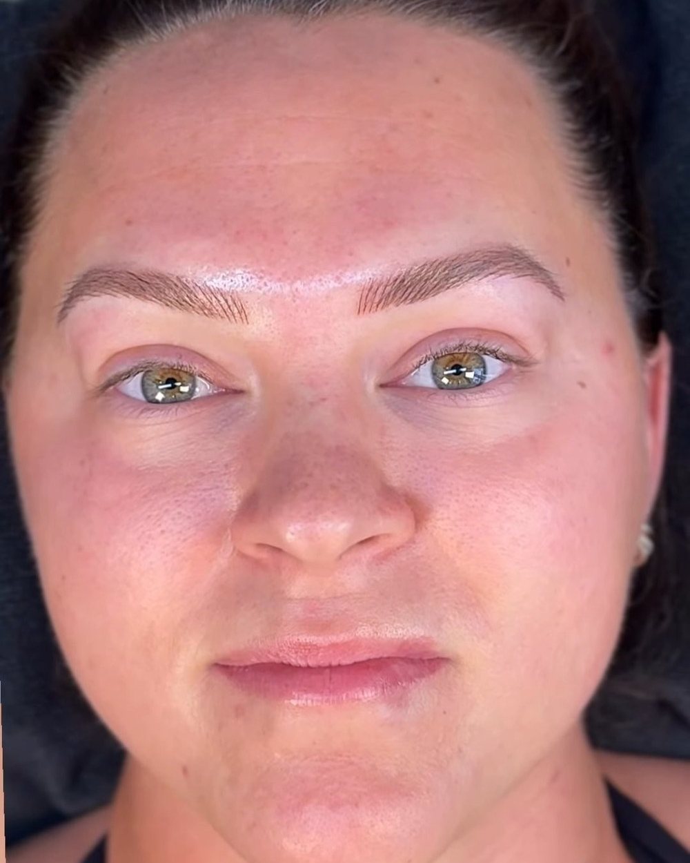 Microblading — close-up portrait of finished brows