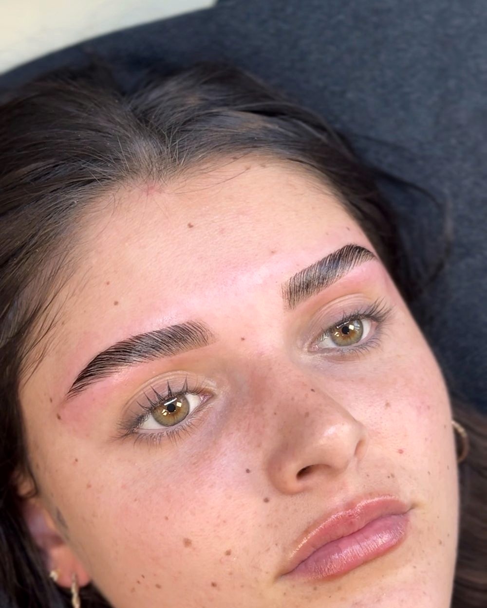 Finished, defined brows on a brunette client